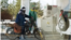 Turkmenistan. Men at a gas station in Baharly (before Bakharden). A man on a motorcycle. Fuel. November 2021