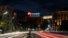 Cars drive past a Huawei logo on a building in central Belgrade, Serbia (file photo).