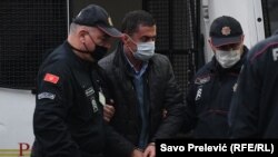Dejan Perunic was detained on October 21 as part of an investigation that was launched after an illegal surveillance bug was found in the office of Montenegro's chief special prosecutor. 