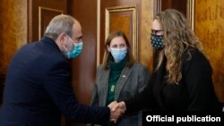 Armenia - Prime Minister Nikol Pashinian greets U.S. Deputy Assistant Secretary of State Erika Olson at the start of their talks in Yerevan, November 3, 2021.