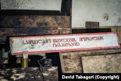 A sign in Georgian for the“Civil Defense Preparation Organization” in a bunker deep below Tbilisi.