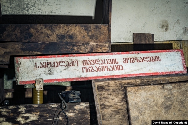 A sign in Georgian for the“Civil Defense Preparation Organization” in a bunker deep below Tbilisi.