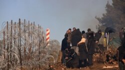 Мігранты ля польскай мяжы ў Горадзенскай вобласьці 9 лістапада 2021