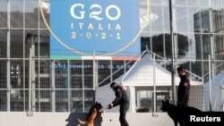 G20 duşuşygy BMG-niň Şotlandiýanyň Glazgow şäherinde geçiriljek howa konferensiýasynyň öň ýanynda geçirilýär.