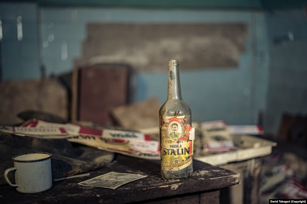 A bottle of vodka named after the infamous Georgian ruler of the Soviet Union in an underground bomb shelter.