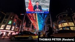 Государственный телеканал CCTV показывает обращение президента Китая Си Цзиньпина, Пекин, 2021 г.