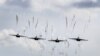 Belarusian military jets fly during the Zapad 2017 war games near the village of Volka, Belarus, on September 19.