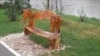 Self-taught sculptor Golub Milanovic carves wooden benches