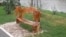 Self-taught sculptor Golub Milanovic carves wooden benches
