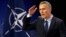Jens Stoltenberg addresses a news conference at NATO headquarters in Brussels on June 28.