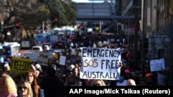 Pamje nga protestat kundër masave të izolimit në Australi.