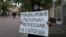 An activist in the Russian city of Astrakhan takes part in a protest against the closure of Memorial on November 14. 