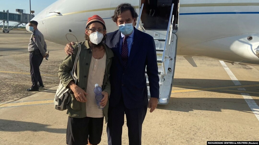 New Mexico Governor Bill Richardson (right) poses for a picture with American journalist Danny Fenster following his release from prison in Myanmar in an undated picture posted on Twitter in November 2021.