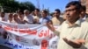 Pakistani journalists pray for colleagues killed in the line of duty on World Press Freedom Day in Peshawar on May 3.