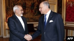 Fransanın xarici işlər naziri Laurent Fabius İranın Xarici İşlər naziri Javad Zarifi ilə görüşü
