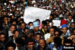 Пратэст афрыканскіх мігрантаў каля будынка ізраільскага парлямэнту ў Ерусаліме, 8 студзеня 2014 году