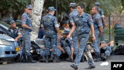 Armenia -- Armenian police officers block the streets to Erebuni police station where gunmen are holding hostages in Yerevan on July 19, 2016. 