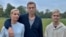 Aleksei Navalny, his wife, Yulia, and son Zahar pose for a picture in Berlin in an image obtained from social media on October 6.