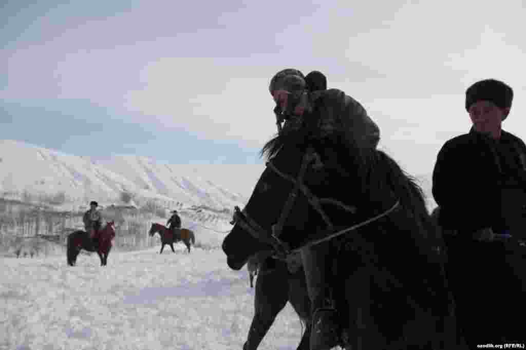 Uzbek horsemen gather for the game.