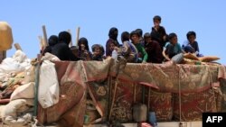 Жителі Ракки, які втекли з-під контролю угруповання «Ісламська держава», червень 2017 року