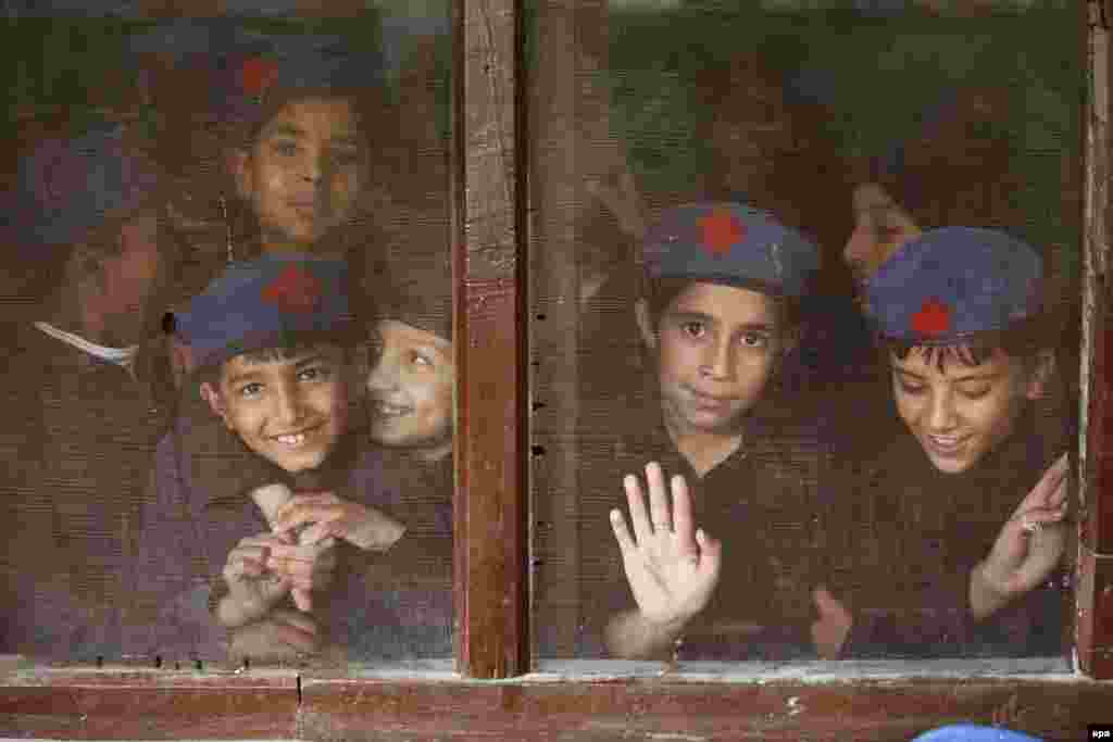 Pakistani boys attend school in Peshawar. International Student Day is marked annually on November 17. (epa/Bilawal Arbab)