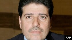 Wael al-Halqi, the former health minister, was appointed Syria's new prime minister.