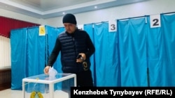 A man casts his vote in Kazakhstan's controversial referendum on nuclear power in Almaty on October 6.