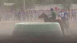 Kyrgyz Horsemen Compete In Goat-Grabbing Championship