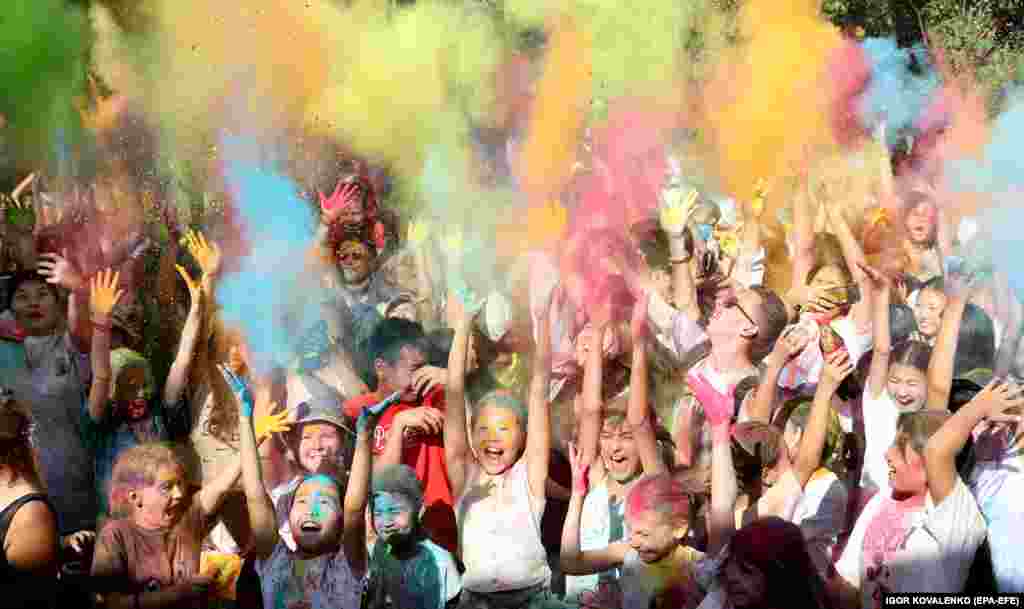 Young people take part in the Festival of Colors at Asanbai Park in Bishkek.