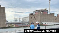 Experții Agenției Internaționale pentru Energie Atomică în vizită la centrala nucleară de la Zaporojie, Ucraina, 1 septembrie 2022.