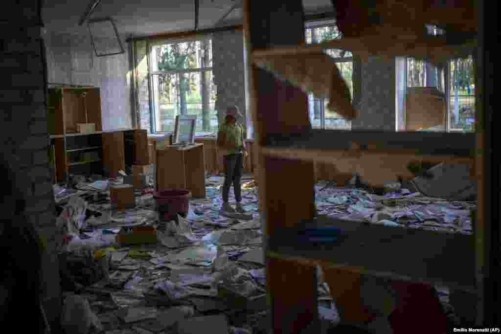 &quot;When my school was bombed, I was terrified. We live nearby. Our windows were damaged, and my mother could have died because the door almost pressed her to the wall. And the chandelier almost fell on me,&quot; said Karina Muzyka, 10, who visits the shattered school every day to play with her friends.