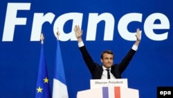 Emmanuel Macron celebrates after the first round of the French presidential election in Paris on April 23.