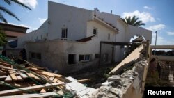 Розбомблений будинок в ізраїльському Ашкелоні після влучання у нього ракети, 16 липня 2014