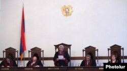 Armenia - The Constitutional Court announces a ruling overturning a controversial pension reform initiated by the government, Yerevan, 2Mar2014.