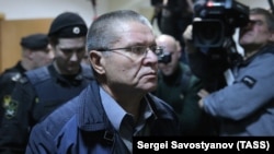 Aleksei Ulyukayev leaves the Basmanny district court after a hearing in Moscow on January 10.