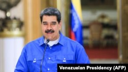 VENEZUELA -- Venezuelan Presidency showing Venezuelan President Nicolas Maduro speaks during a video conference meeting with members of his cabinet, at Miraflores Presidential Palace in Caracas, June 1, 2020