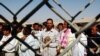 Iraqi prisoners waiting to be released from Abu Ghraib prison