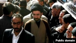 Hard-line cleric Mojtaba Khamenei (center) is the second son of current Iranian Supreme Leader Ali Khamenei.