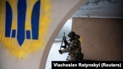 Ukrajinski vojnik na prvoj liniji bojišnice, regija Donjeck, 29. siječnja 2023.