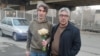 Iranian rights activist Arash Sadeghi (left) poses with his father on January 21. 