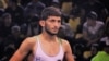 Iranian wrestler Mohammad Namjoomotlagh is the latest athlete to seek refuge in the West after failing afoul of the clerical establishment.