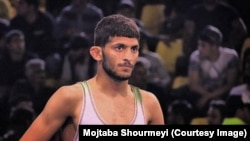 Iranian wrestler Mohammad Namjoomotlagh is the latest athlete to seek refuge in the West after failing afoul of the clerical establishment.