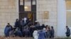 Nagorno-Karabakh - Residents of Stepanakert line up to receive ration coupons, January 19, 2023.