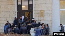 Nagorno-Karabakh - Residents of Stepanakert line up to receive ration coupons, January 19, 2023.