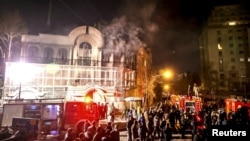 Flames rise from Saudi Arabia's embassy after it was stormed by hardline protesters during a demonstration in Tehran, January 2, 2016. Lack of police intervention led to suspicions of complicity by security forces.