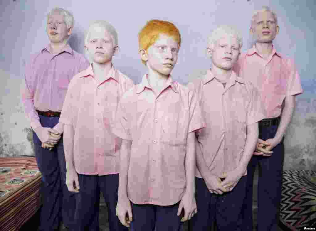 Brent Stirton, a South African photographer working for Reportage by Getty Images, won first prize in the People - Staged Portraits Single category with this picture of a group of blind albino boys in their boarding room at a mission school for the blind in West Bengal, India.