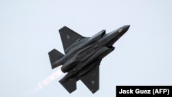 ISRAEL -- An Israeli Air Force F-35 Lightning II fighter jet performs during an air show at the graduation ceremony of Israeli air force pilots at the Hatzerim Israeli Air Force base in the Negev desert, near the southern city of Beer Sheva, December 27, 