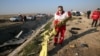IRAN -- Rescue teams recover debris from a field after a Ukrainian plane carrying 176 passengers crashed near Imam Khomeini airport in the capital Tehran, January 8, 2020