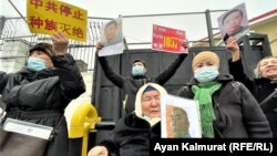 People demonstrate outside the Chinese Consulate in Almaty, demanding the release of relatives in China's Xinjiang region, in February 2021.