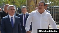 Armenia - President Serzh Sarkisian (L) and businessman Gagik Tsarukian make a joint public appearance, Yerevan, 11Sep2015.